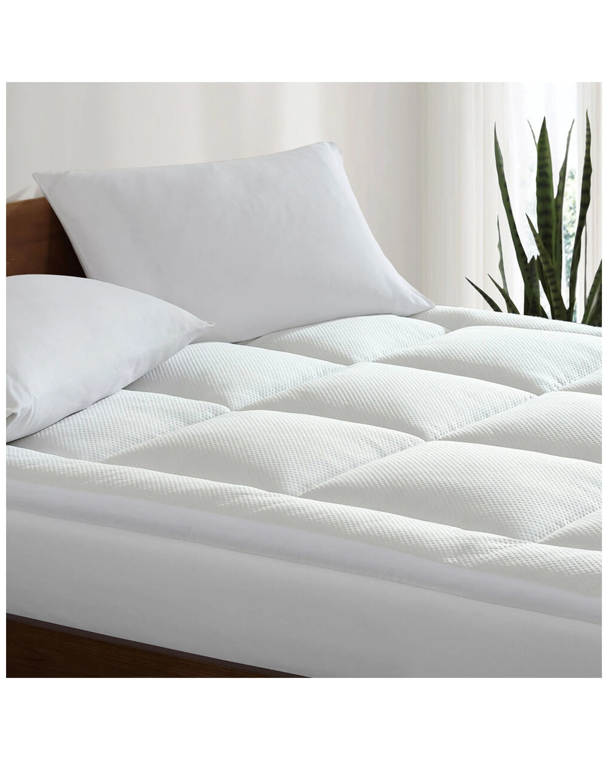 Close-up of quilted stitching texture on the mattress topper