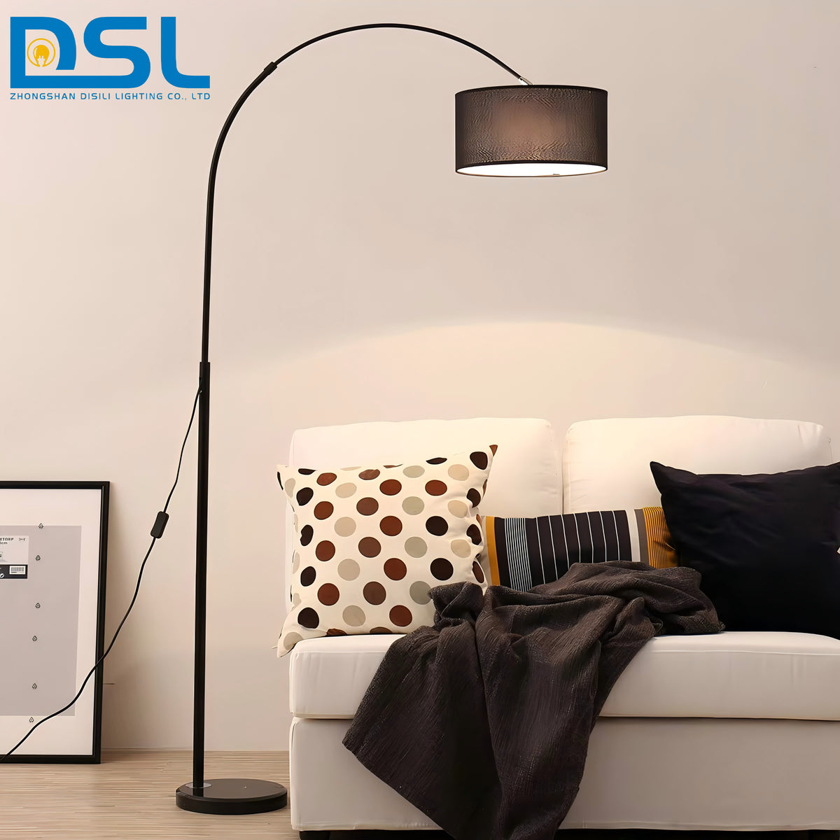 Black arc floor lamp in living room